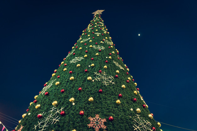 Christmas Carols,Closeup of Christmas tree and lights background